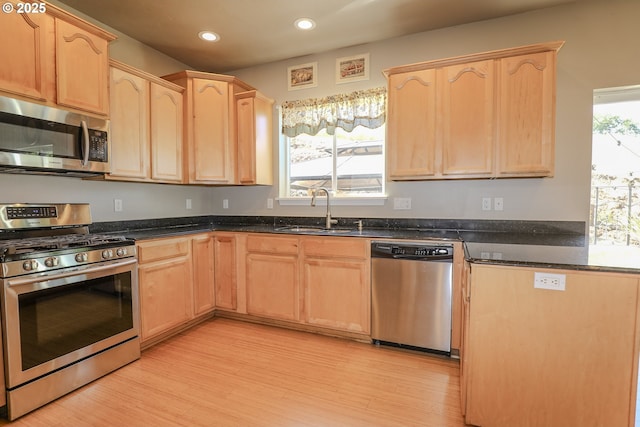 1680 NW Avery St, Roseburg, OR 97471 - kitchen with appliances with stainless steel finishes, a sink, light brown cabinetry, and recessed lighting