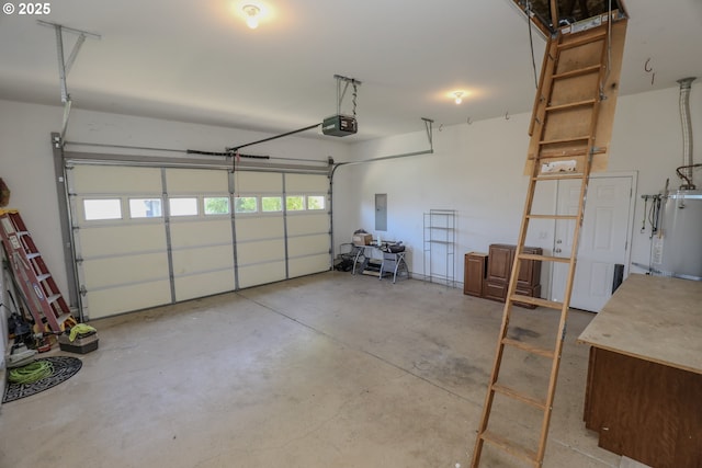 1680 NW Avery St, Roseburg, OR 97471 - garage featuring a garage door opener, water heater, and electric panel