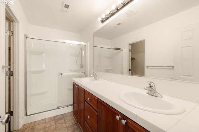 17246 SW Pleasanton Ln, Beaverton, OR 97003 - bathroom featuring a stall shower, double vanity, and a walk in closet