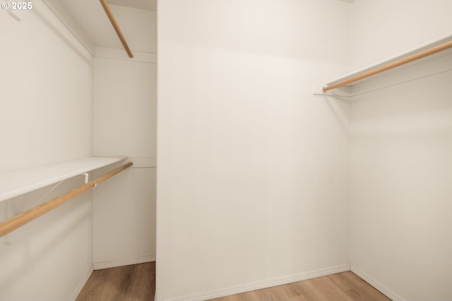 17246 SW Pleasanton Ln, Beaverton, OR 97003 - walk in closet with light wood finished floors