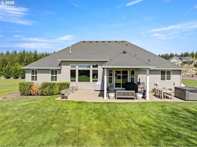 21823 NE 172nd St, Brush Prairie, WA 98606 - rear view of house with a lawn, roof with shingles, and a patio area