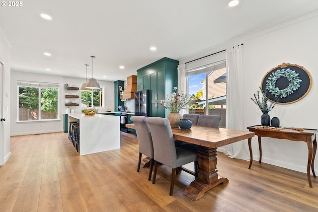 dining space with recessed lighting, baseboards, and a wealth of natural light