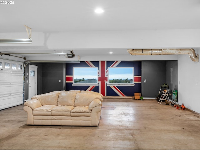 garage featuring a garage door opener and recessed lighting