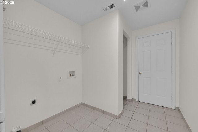 washroom with laundry area, visible vents, electric dryer hookup, washer hookup, and baseboards