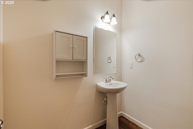 5944 SE Thornapple St, Hillsboro, OR 97123 - bathroom featuring baseboards and wood finished floors
