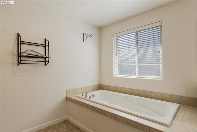 5944 SE Thornapple St, Hillsboro, OR 97123 - bathroom featuring a bath and baseboards