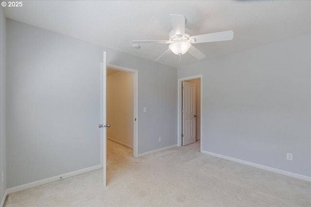 5944 SE Thornapple St, Hillsboro, OR 97123 - spare room with ceiling fan, light carpet, baseboards, and a smoke detector