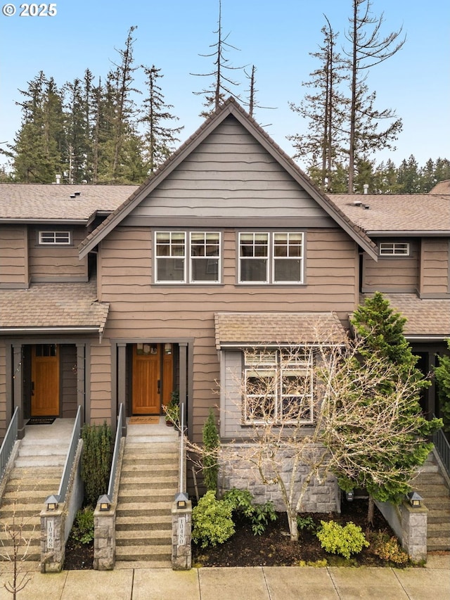 view of front of house featuring a shingled roof