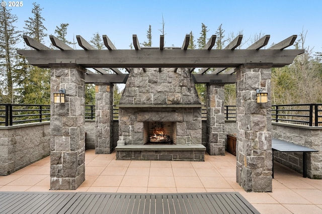 10480 SW Windwood Way, Portland, OR 97225 - view of patio / terrace featuring an outdoor stone fireplace
