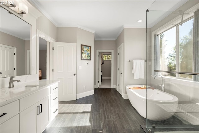9522 NW Skyview Dr, Portland, OR 97231 - full bath featuring vanity, a freestanding bath, baseboards, recessed lighting, and crown molding