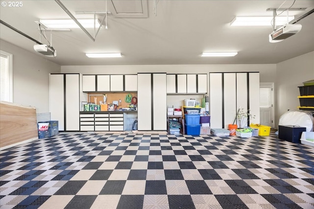 9522 NW Skyview Dr, Portland, OR 97231 - garage featuring a garage door opener