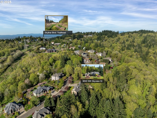 9522 NW Skyview Dr, Portland, OR 97231 - aerial view of property and surrounding area featuring a forest and nearby suburban area