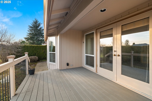 wooden terrace featuring french doors