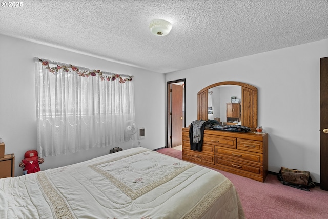 231 NE Chestnut Ave, Myrtle Creek, OR 97457 - carpeted bedroom with a textured ceiling and arched walkways