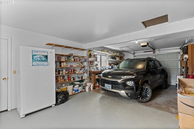231 NE Chestnut Ave, Myrtle Creek, OR 97457 - garage featuring a garage door opener