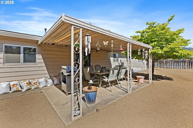 231 NE Chestnut Ave, Myrtle Creek, OR 97457 - view of patio featuring outdoor dining space and area for grilling
