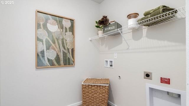 laundry room with electric dryer hookup, baseboards, and washer hookup