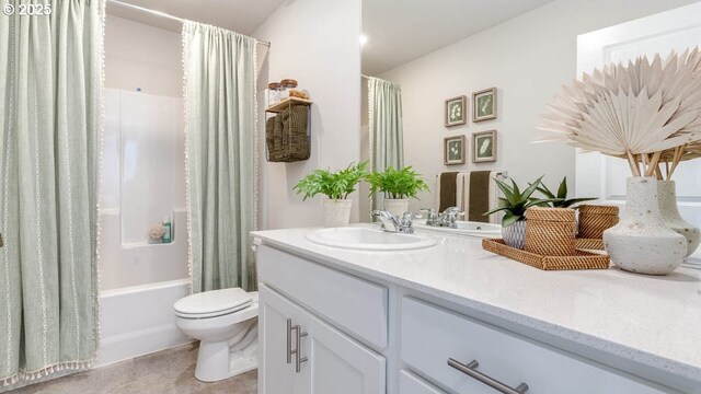 bathroom featuring toilet, vanity, tile patterned flooring, and shower / bathtub combination with curtain