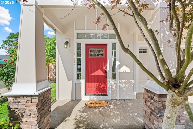 4345 SW Vino Pl, Beaverton, OR 97078 - property entrance with covered porch and stucco siding