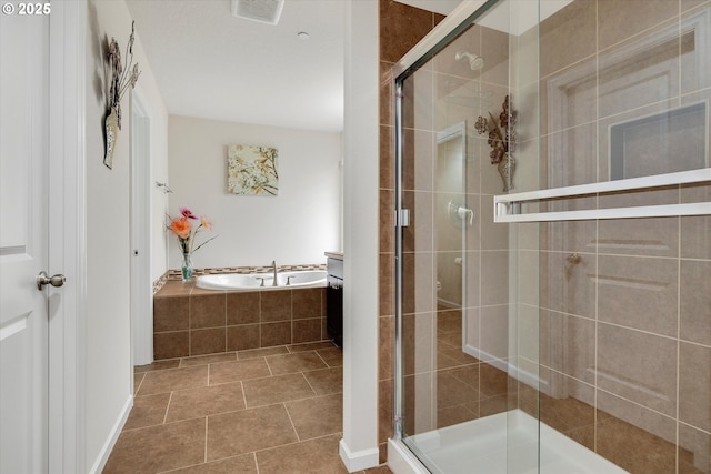 bathroom featuring separate shower and tub and tile patterned floors