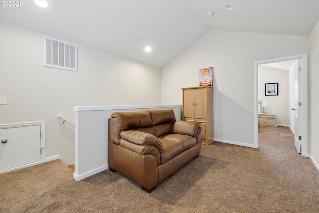 living area with lofted ceiling and carpet flooring