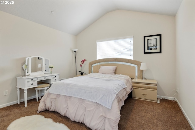 bedroom featuring vaulted ceiling and dark carpet