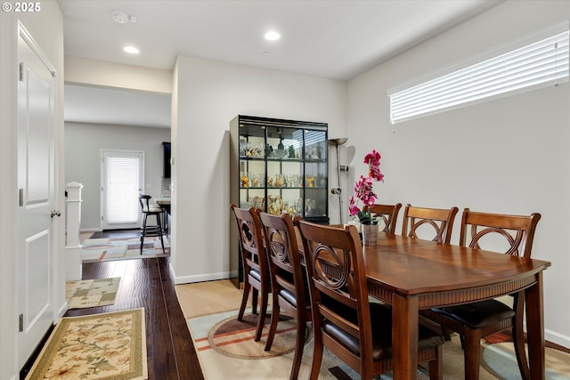 dining room with light hardwood / wood-style flooring