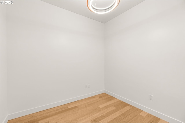 922 NW 11th Ave Unit 209, Portland, OR 97209 - empty room with baseboards and light wood-style flooring
