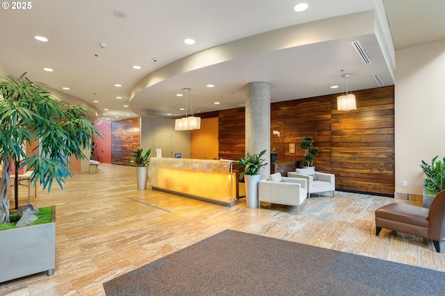 922 NW 11th Ave Unit 209, Portland, OR 97209 - reception featuring recessed lighting, decorative columns, and wooden walls