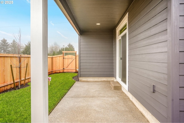 view of patio / terrace with a gate and fence