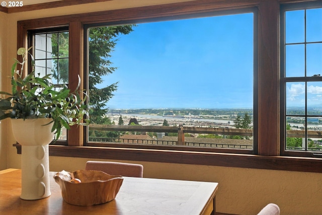368 NW Lomita Ter, Portland, OR 97210 - dining room with plenty of natural light, wood finished floors, and a water view