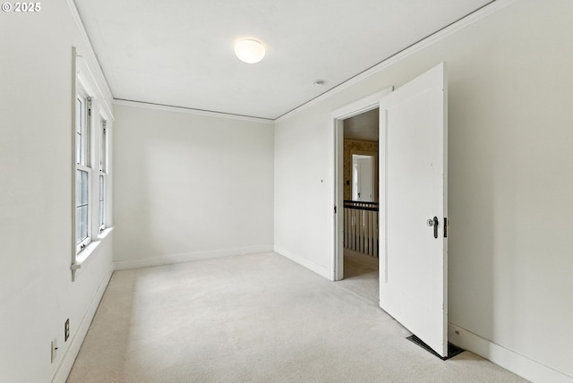 368 NW Lomita Ter, Portland, OR 97210 - carpeted empty room featuring crown molding and baseboards