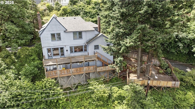 368 NW Lomita Ter, Portland, OR 97210 - back of property with a chimney, a deck, and a shingled roof