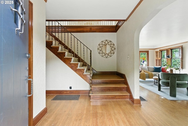 368 NW Lomita Ter, Portland, OR 97210 - stairway with wood finished floors and arched walkways