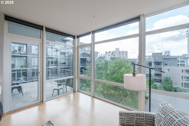 1255 NW 9th Ave Unit 508, Portland, OR 97209 - sunroom with healthy amount of natural light and a city view