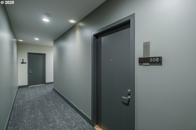 1255 NW 9th Ave Unit 508, Portland, OR 97209 - hall featuring recessed lighting, baseboards, and dark colored carpet