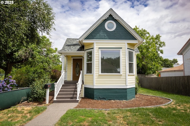 215 W 9th St, The Dalles, OR 97058 - victorian house with a shingled roof