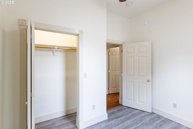 215 W 9th St, The Dalles, OR 97058 - unfurnished bedroom featuring wood finished floors and a closet
