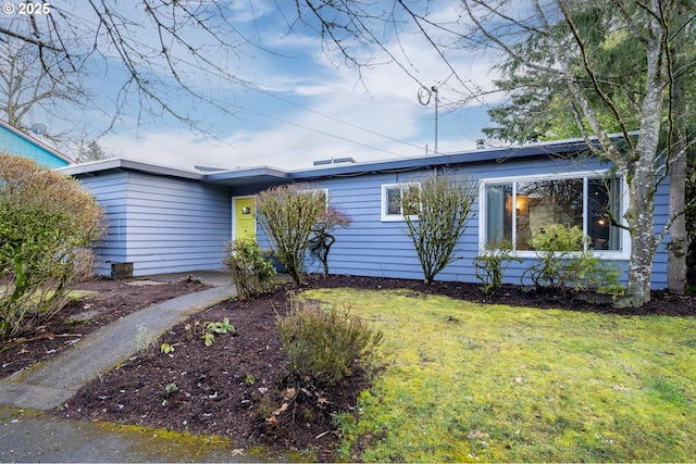 view of front of house with a front yard