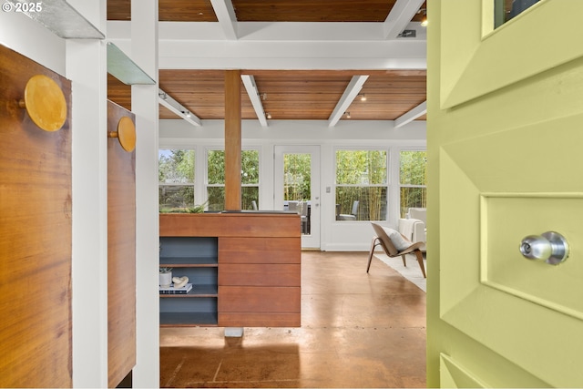 interior space featuring beam ceiling and wooden ceiling