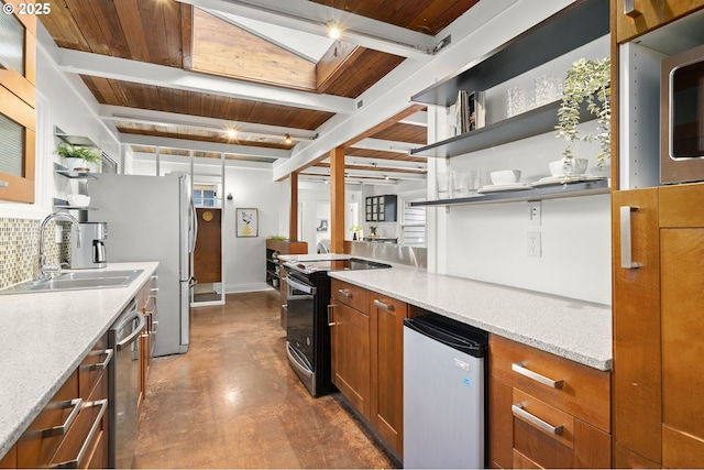 kitchen featuring backsplash, open shelves, beam ceiling, appliances with stainless steel finishes, and a sink