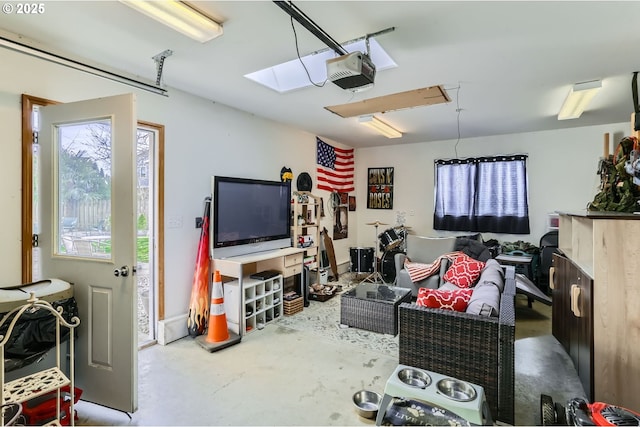 living room featuring a garage and concrete floors