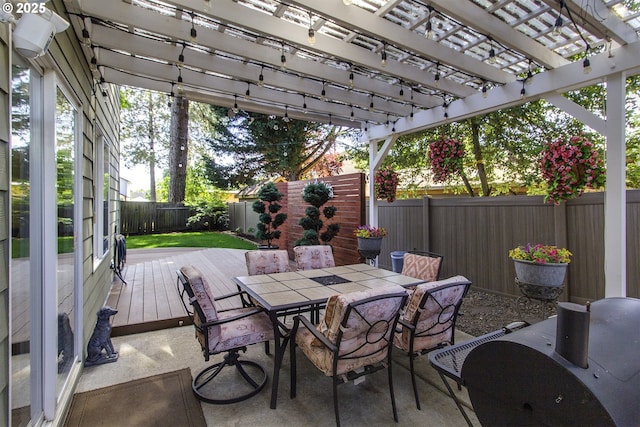 4422 SW Appletree Pl, Beaverton, OR 97078 - fenced backyard featuring outdoor dining space, a pergola, and a deck