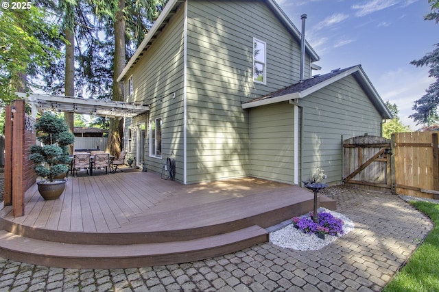 4422 SW Appletree Pl, Beaverton, OR 97078 - rear view of house featuring outdoor dining space, a pergola, a deck, and a gate