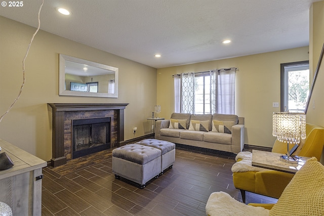 4422 SW Appletree Pl, Beaverton, OR 97078 - living area with recessed lighting, a fireplace, dark wood-type flooring, and baseboard heating