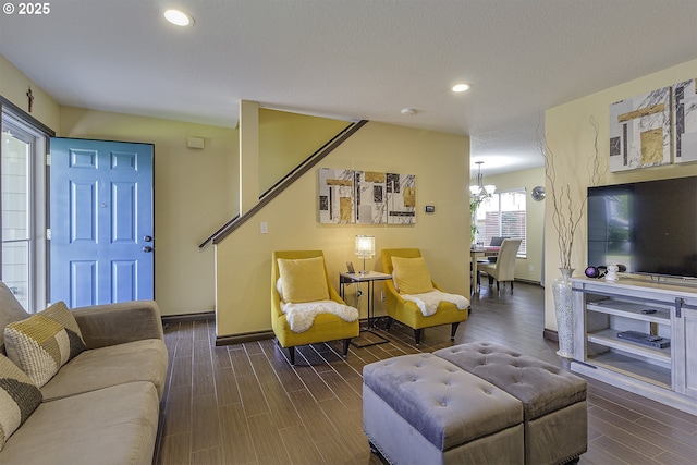 4422 SW Appletree Pl, Beaverton, OR 97078 - living area with wood finished floors, a chandelier, recessed lighting, and stairs