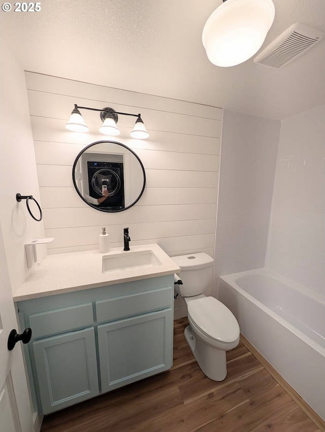 620 Wimbledon Ct, Eugene, OR 97401 - full bath with wood finished floors, toilet, vanity, and a bath