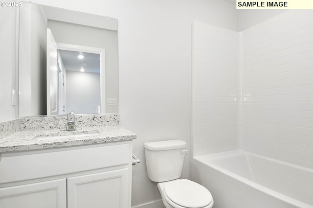 full bath featuring shower / bathtub combination, toilet, and vanity