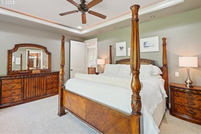 bedroom with recessed lighting, a raised ceiling, ceiling fan, and light colored carpet