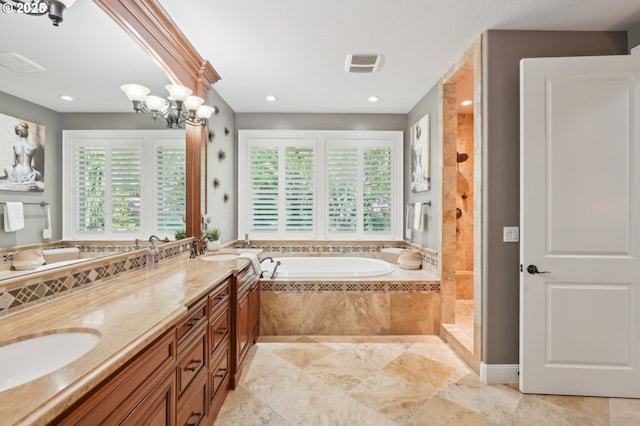 full bath with visible vents, a healthy amount of sunlight, a bath, and a sink